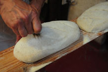 Cutting the sourdough loaves